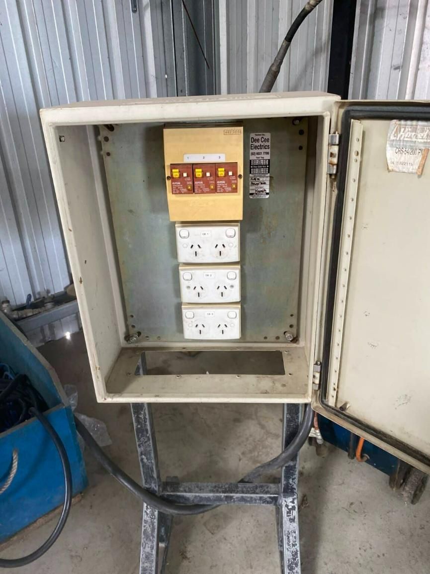 A Box With a Bunch of Electrical Outlets Inside of It — Hamblin Hire in Albury, NSW