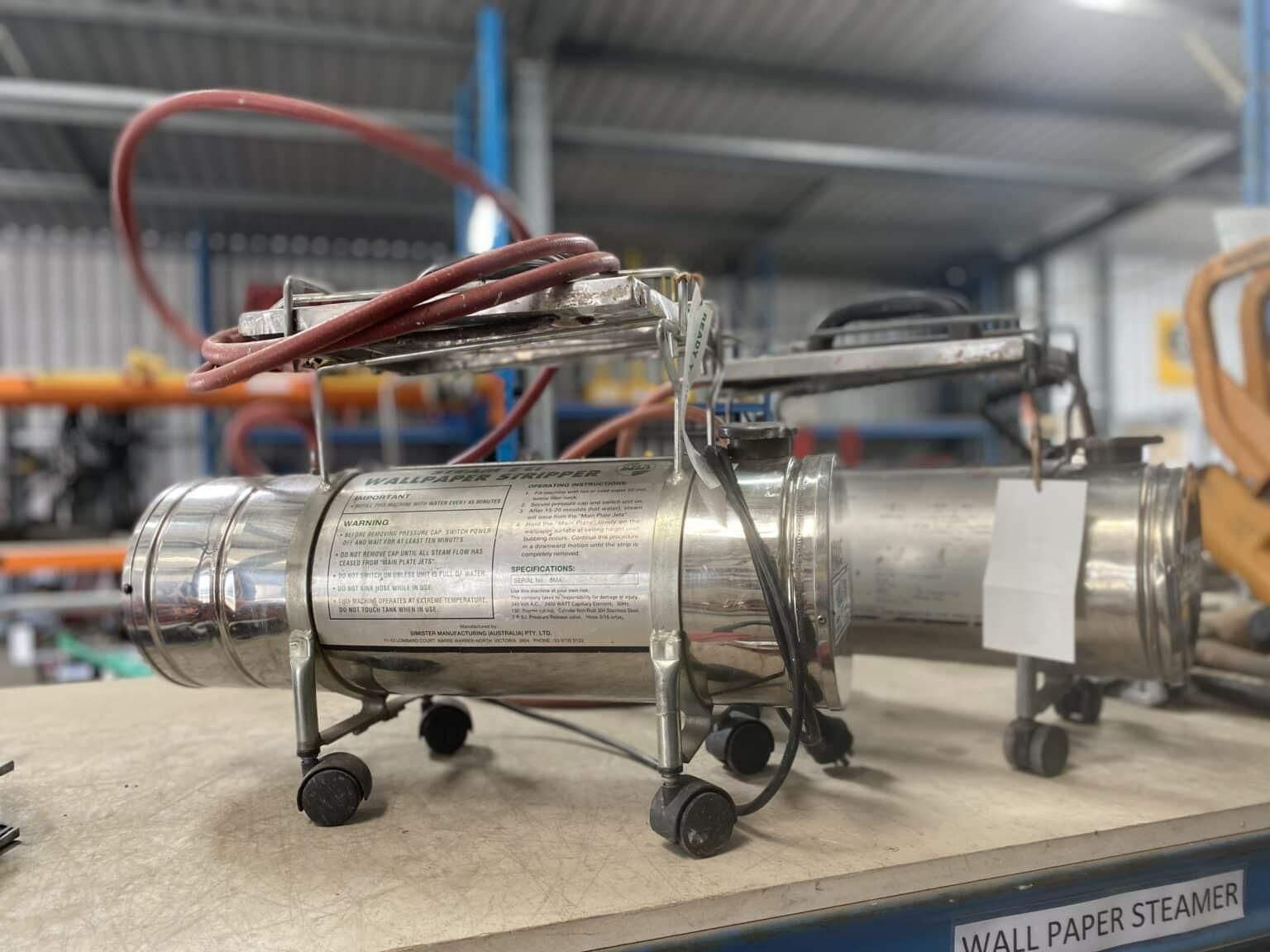 A Stainless Steel Steamer is Sitting on a Table in a Warehouse — Hamblin Hire in Albury, NSW