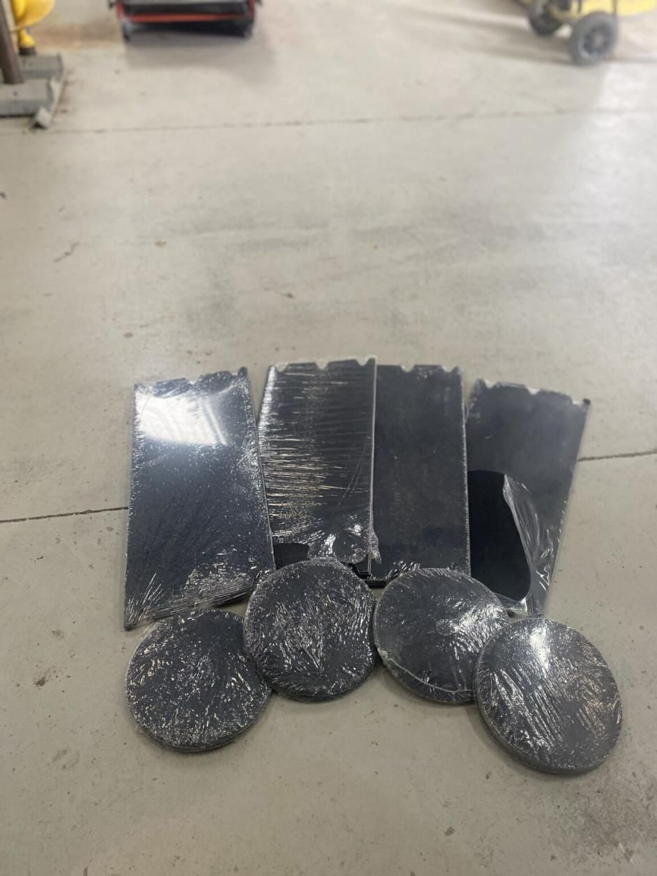 A Bunch of Pieces of Metal Are Laying on the Floor — Hamblin Hire in Albury, NSW