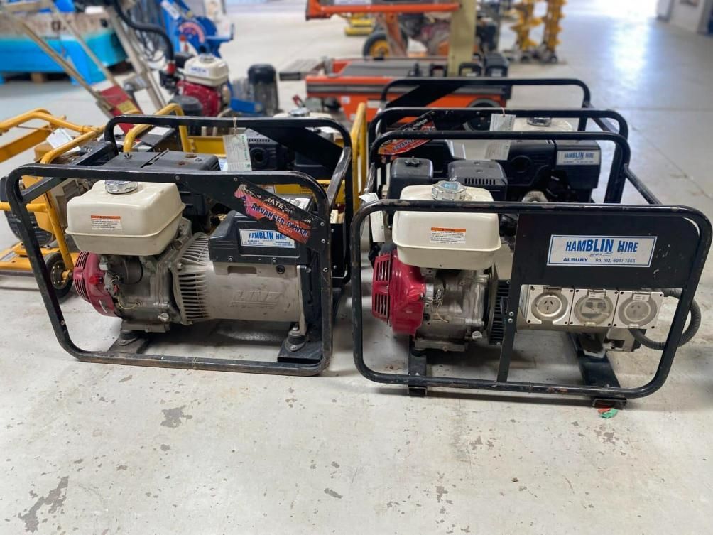 Two Generators Are Sitting Next to Each Other in a Warehouse — Hamblin Hire in Albury, NSW