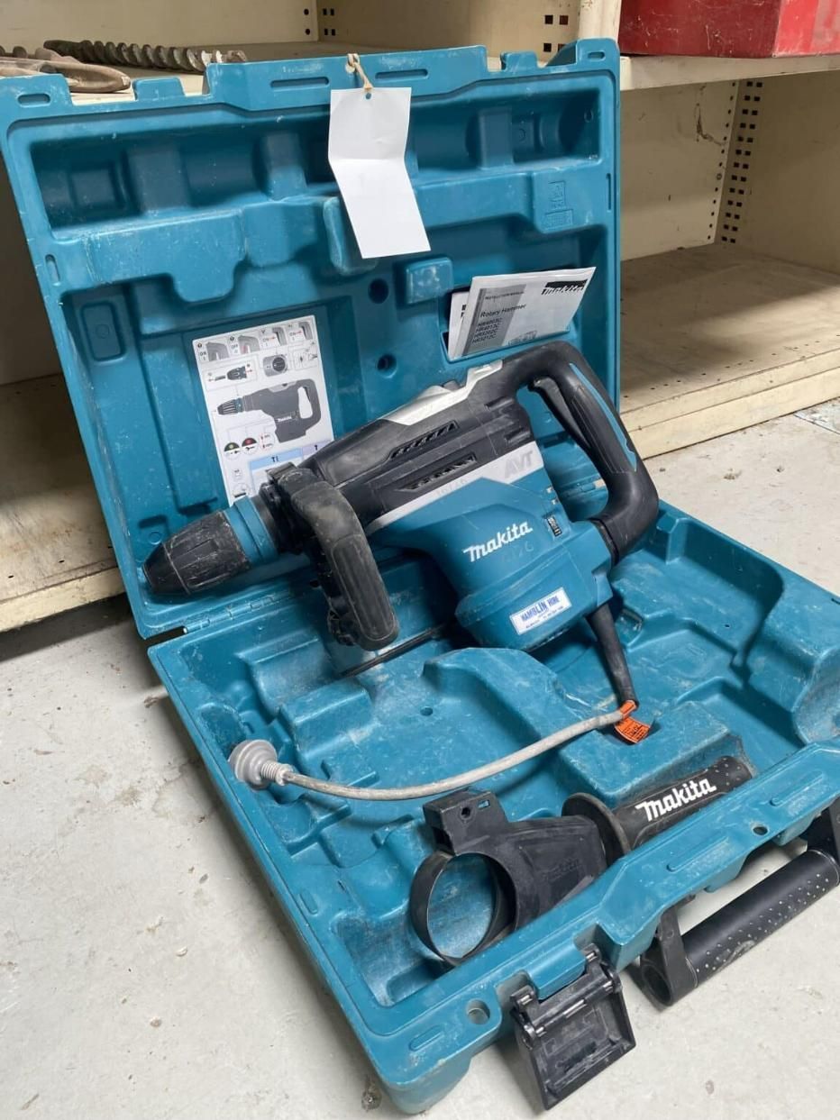 A Makita Hammer is Sitting in a Blue Case — Hamblin Hire in Albury, NSW