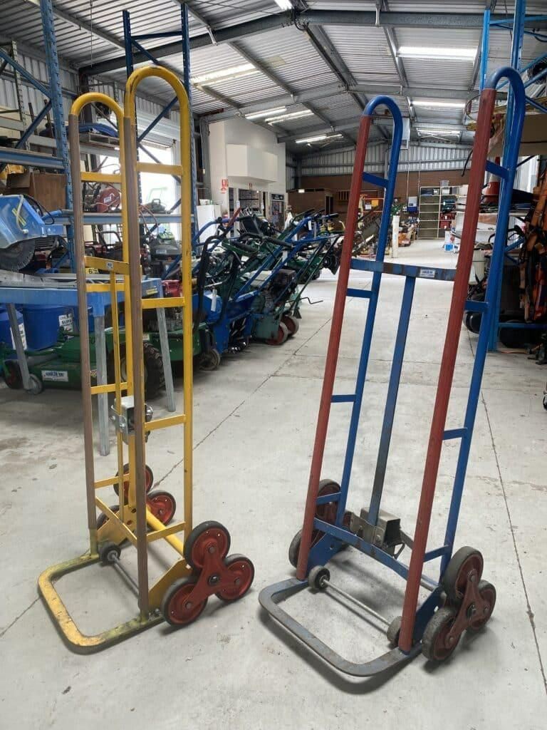 Two Hand Trucks Are Sitting Next to Each Other in a Warehouse — Hamblin Hire in Albury, NSW