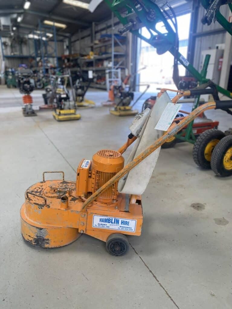 A Machine is Sitting on a Concrete Floor in a Warehouse — Hamblin Hire in Albury, NSW