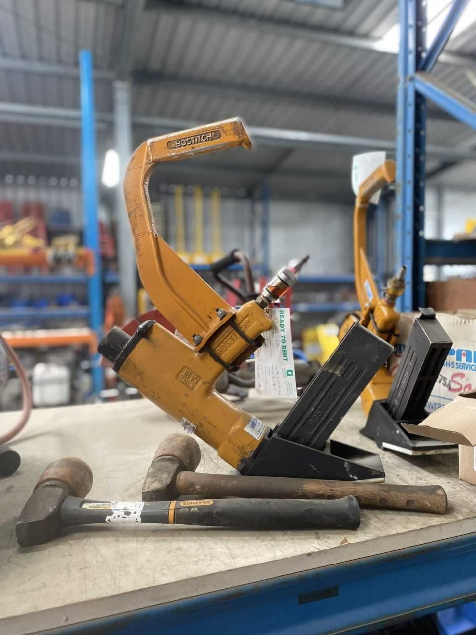 A Bunch of Tools Are Sitting on a Table in a Warehouse — Hamblin Hire in Albury, NSW