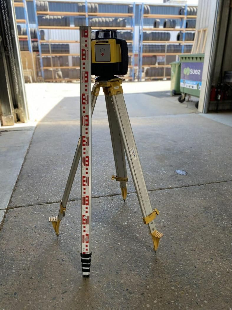A Laser Level is Sitting on Top of a Tripod — Hamblin Hire in Albury, NSW