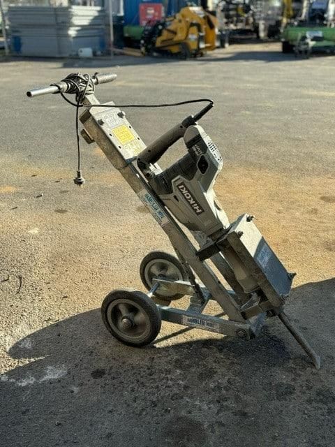 A Concrete Breaker on Wheels is Sitting on the Side of the Road — Hamblin Hire in Albury, NSW