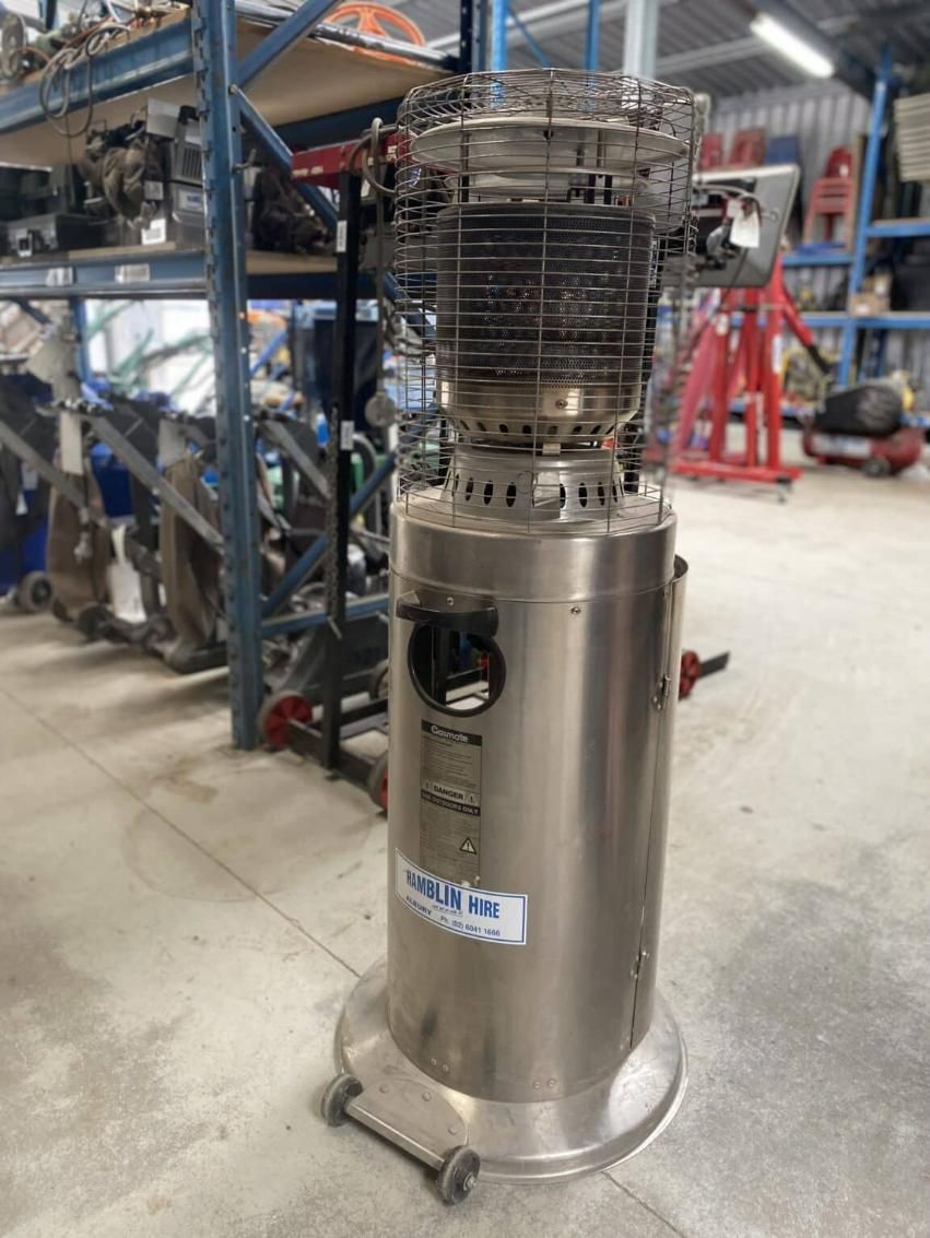 A Stainless Steel Heater is Sitting in a Warehouse — Hamblin Hire in Albury, NSW