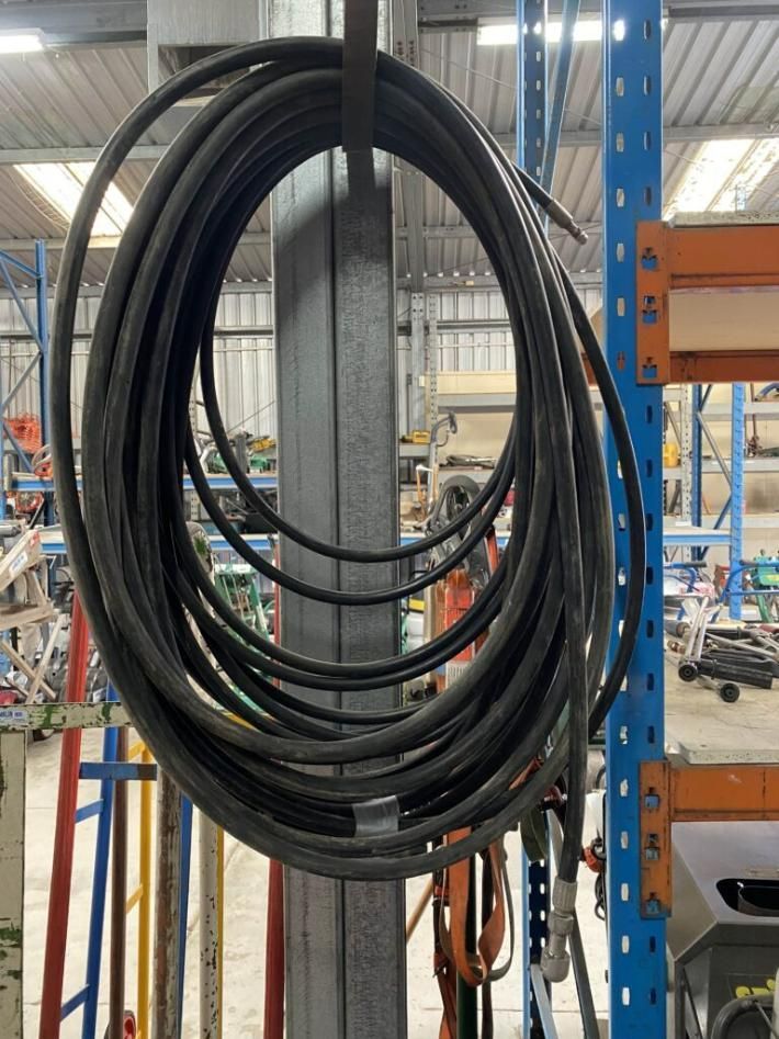 A Bunch of Wires Hanging From a Pole in a Warehouse — Hamblin Hire in Albury, NSW