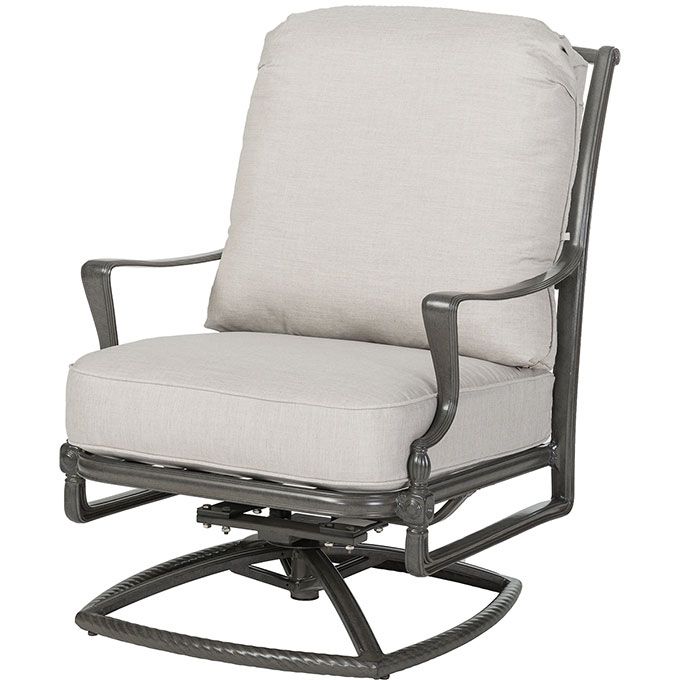 A rocking chair with a white cushion on a white background
