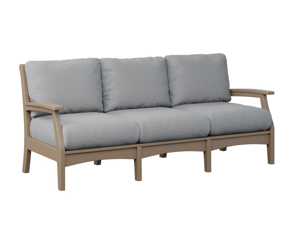 A couch with gray cushions and wooden frame on a white background.