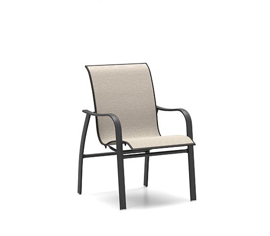 A chair with a beige cushion on a white background