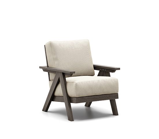 A wooden chair with a white cushion on a white background