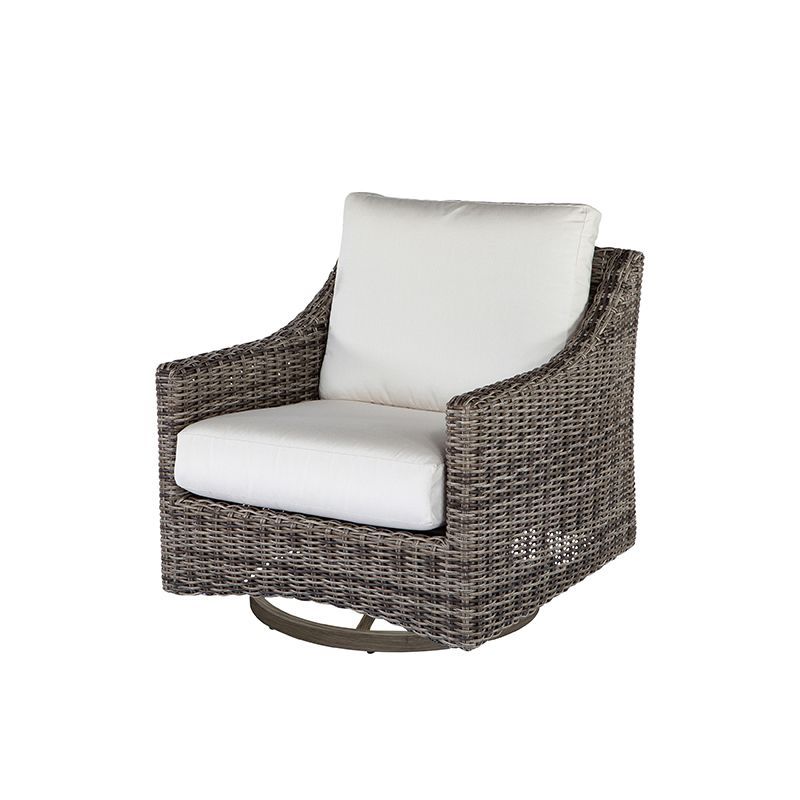 A wicker chair with a white cushion on a white background