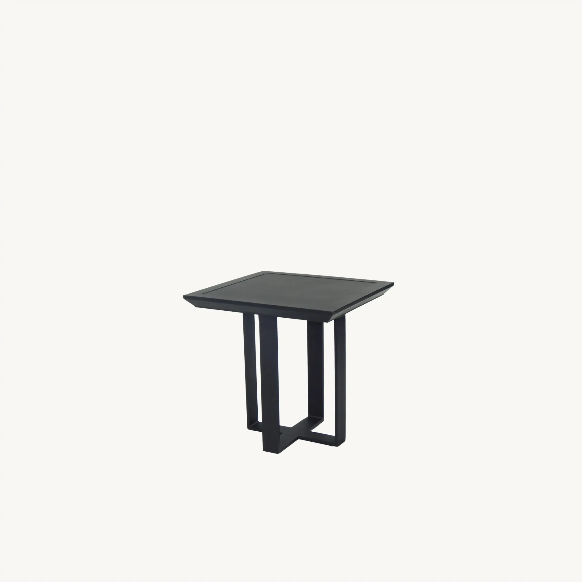 A small black table on a white background.