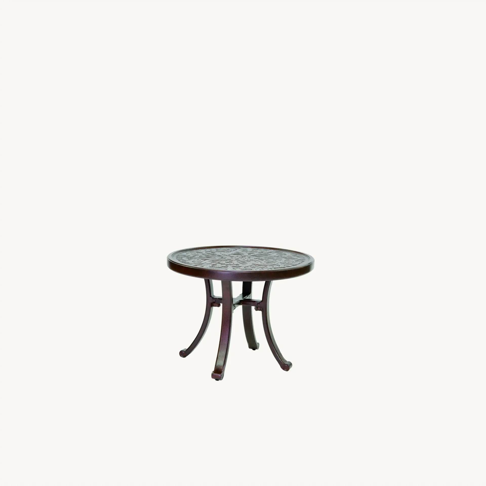 A small round table with a mosaic top on a white background.