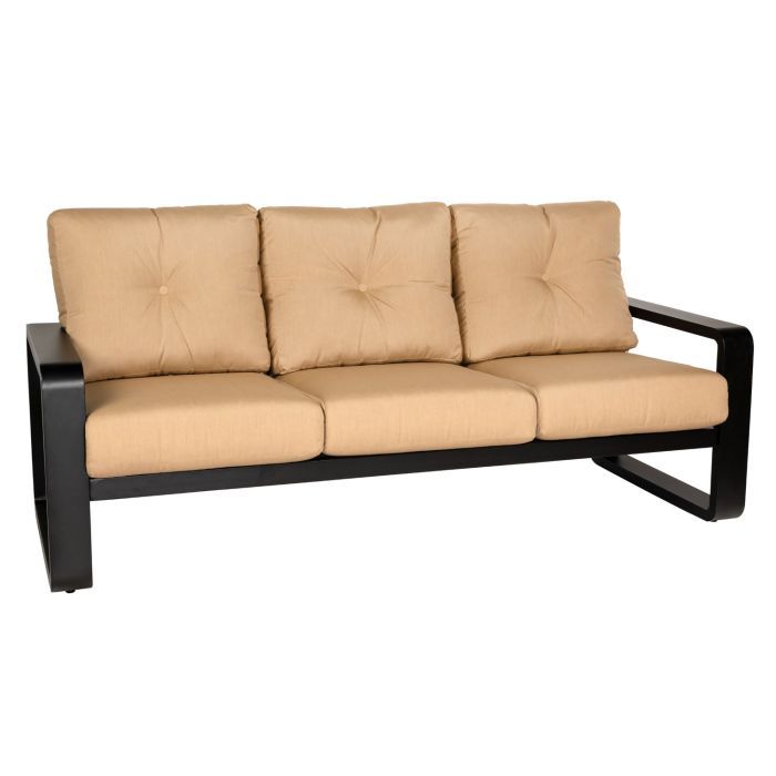 A brown couch with three pillows on a white background.