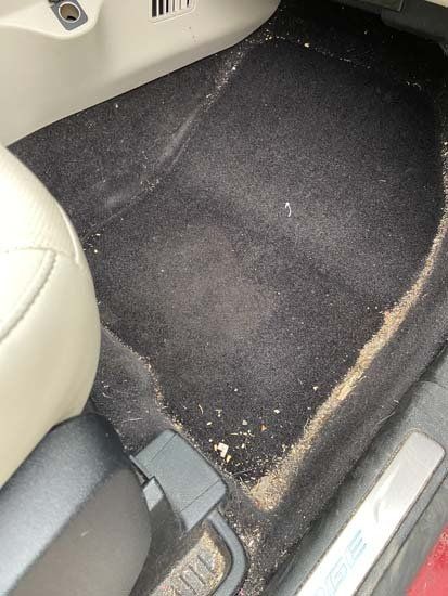 dirty black floor mat