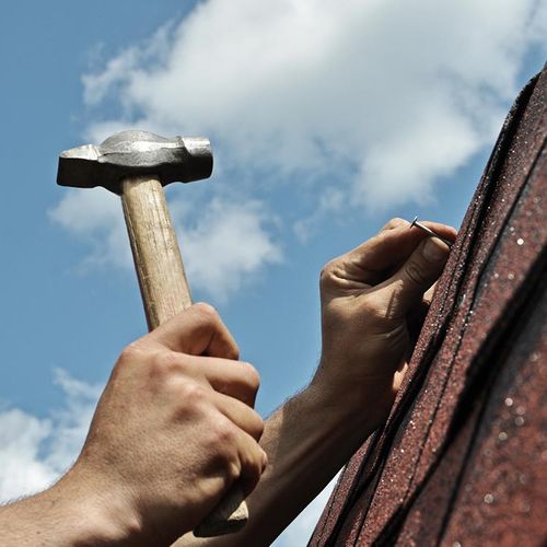 Worker Installing Shingle Roof — San Rafael, CA — DeMello Roofing