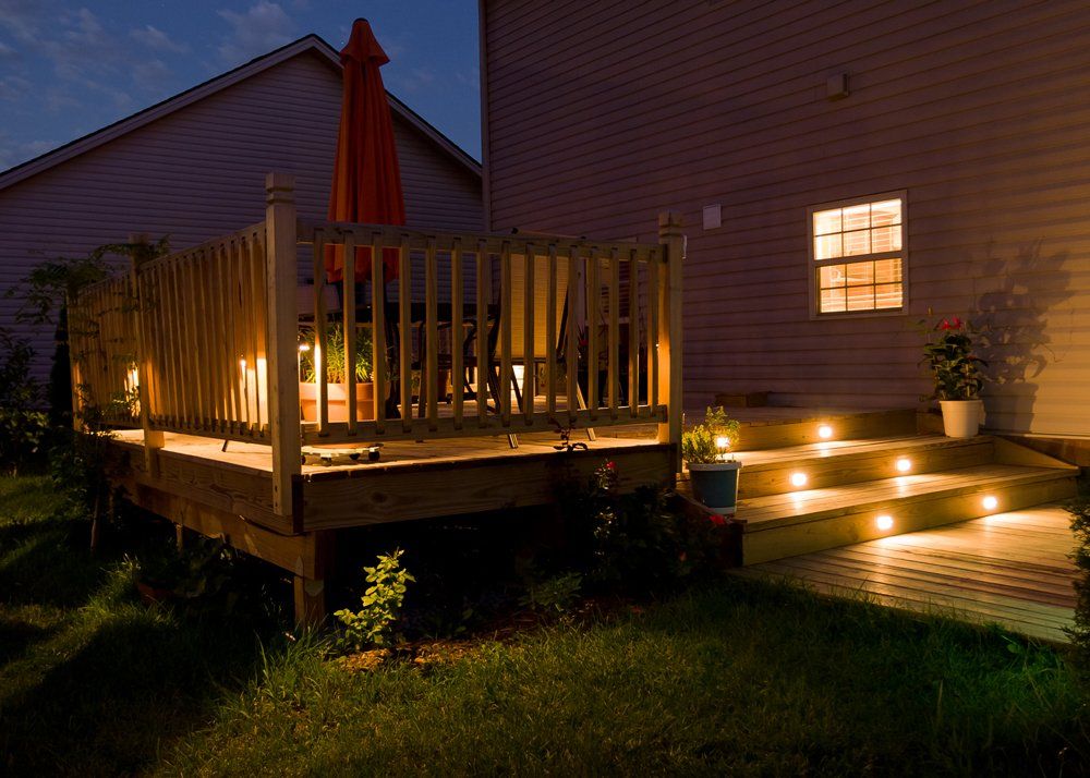 Wooden Deck and Patio of Family Home at Night — Vineland, NJ — Wells Electric
