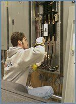 Electrician Working on Breaker — Vineland, NJ — Wells Electric