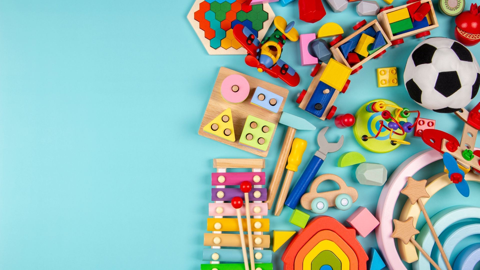 there are many different types of toys on the table .