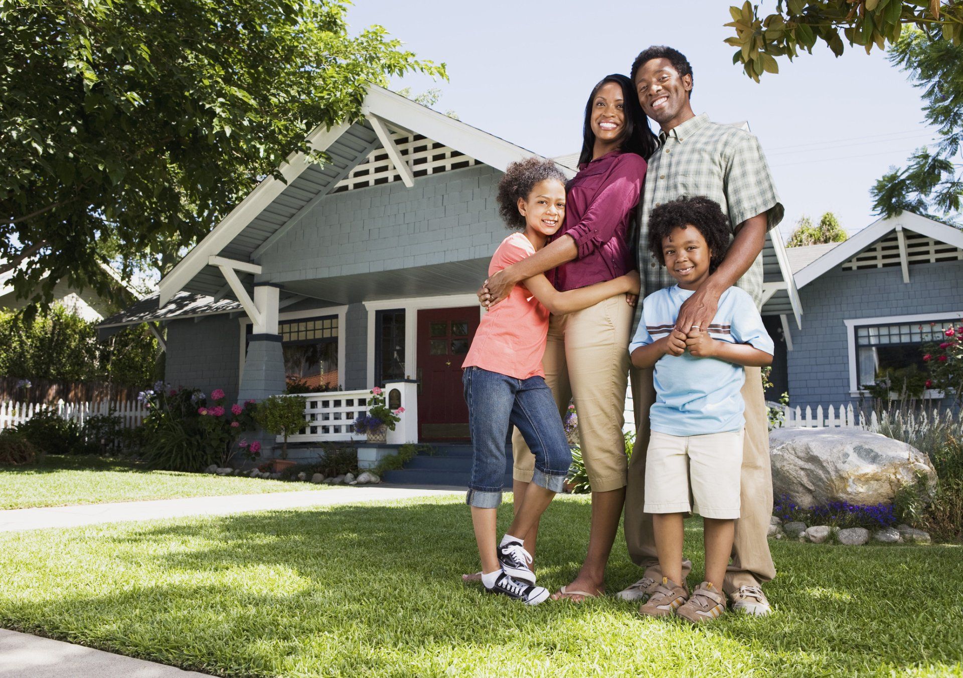 Happy Family Outside Their House — Mechanicsville, VA — Hanover Air