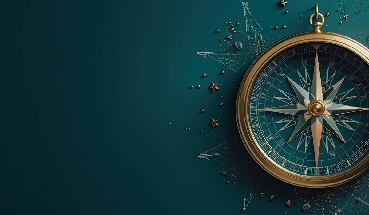 Golden compass on teal background, indicating direction.