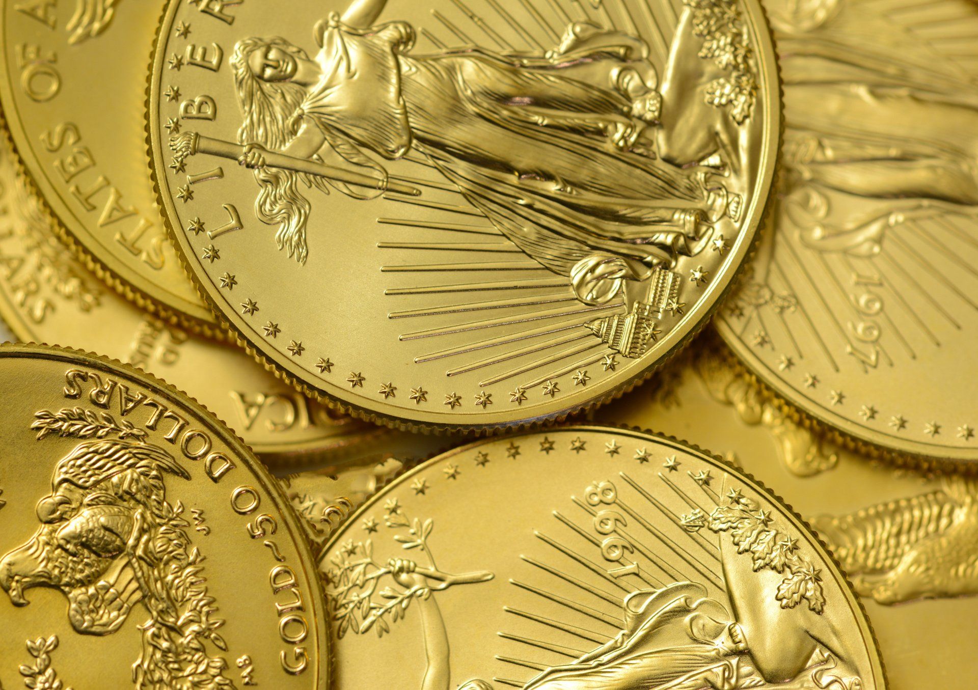 Gold coins piled on top of each other | Fullerton Financial