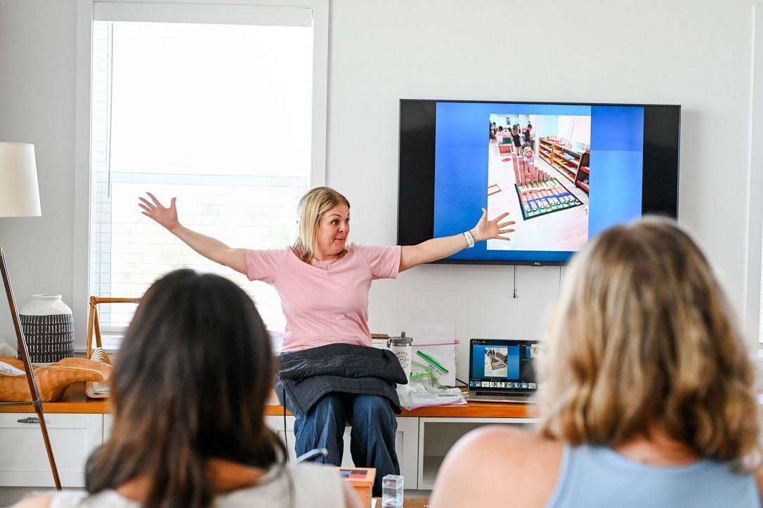 montessori presenting classroom materials in workshop setting