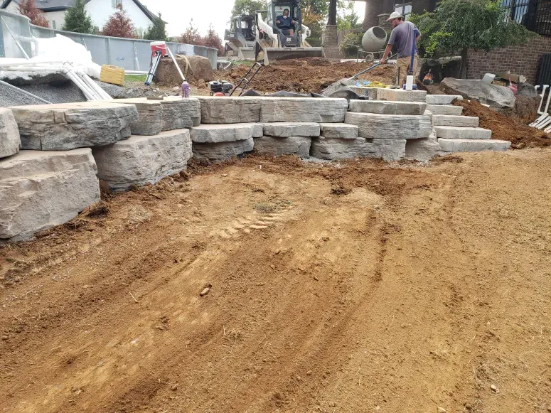 A construction site with a lot of dirt and rocks