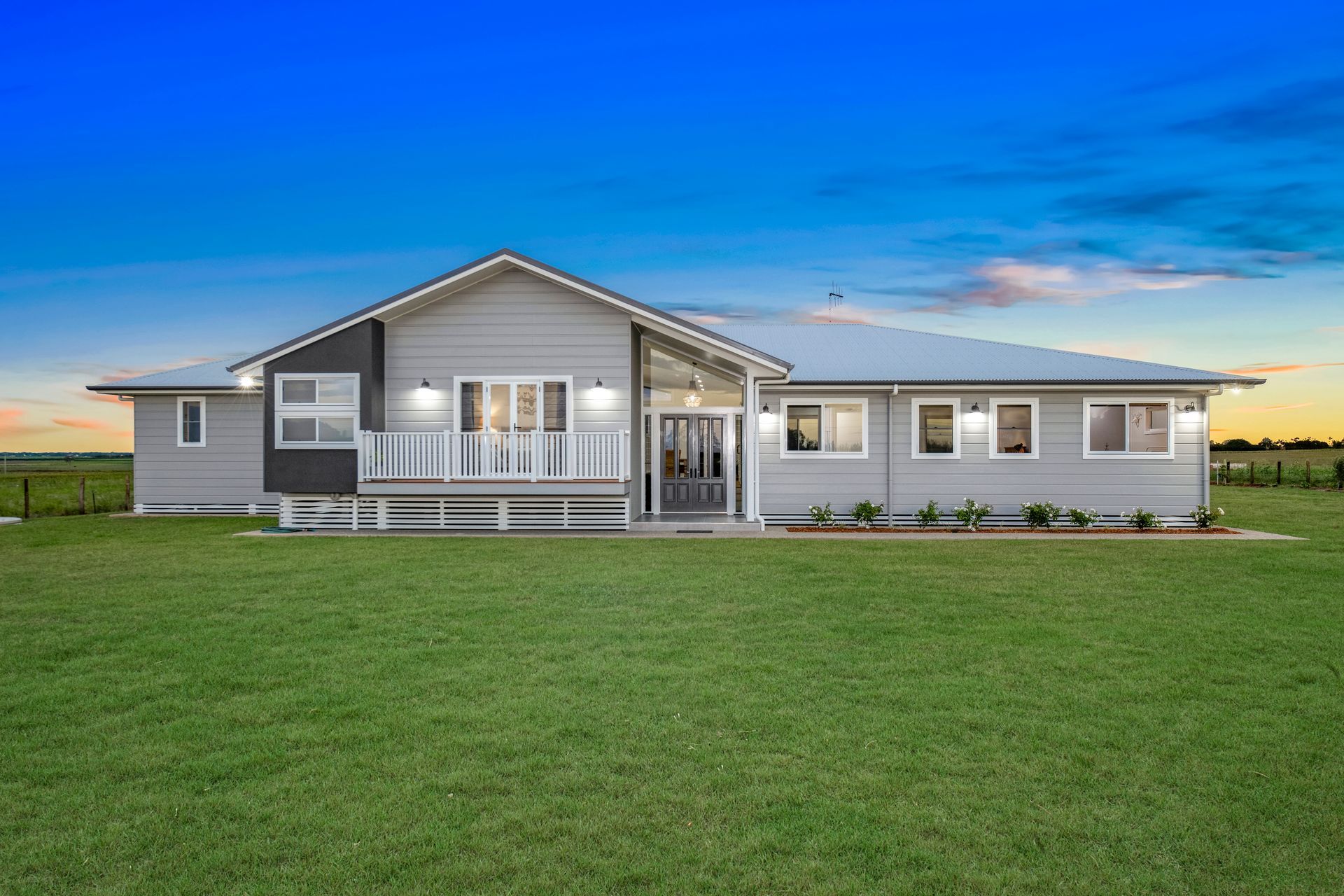 Single-Story Grey House with White Trim — Gatley Building Design in Bargara, QLD