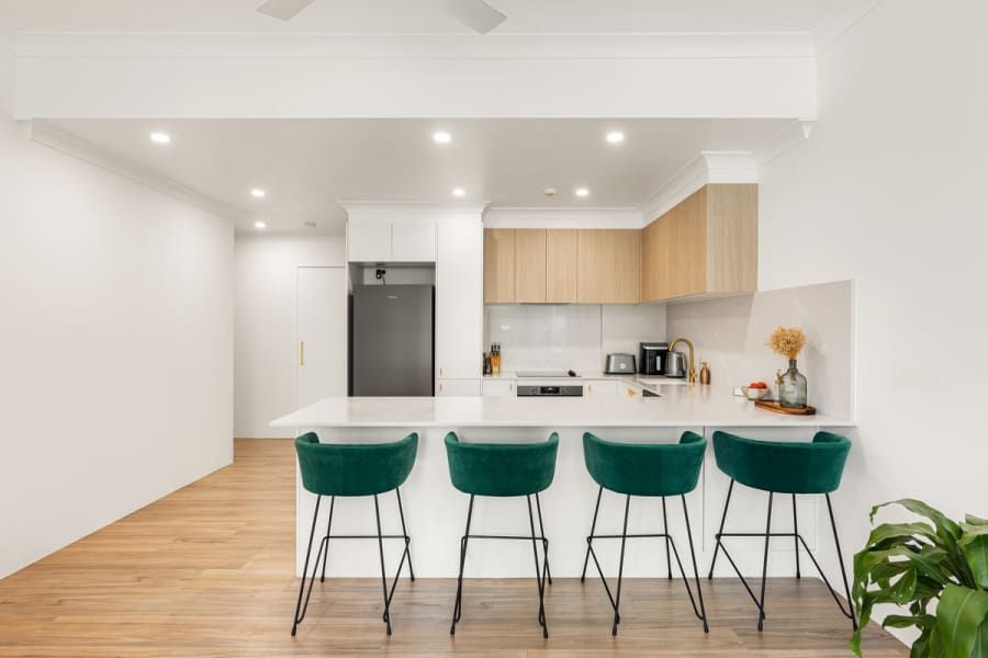 Modern Kitchen With a Breakfast Bar — Zero 21 Fit-Outs & Joinery: Kitchen Renovation Gold Coast in Molendinar, QLD