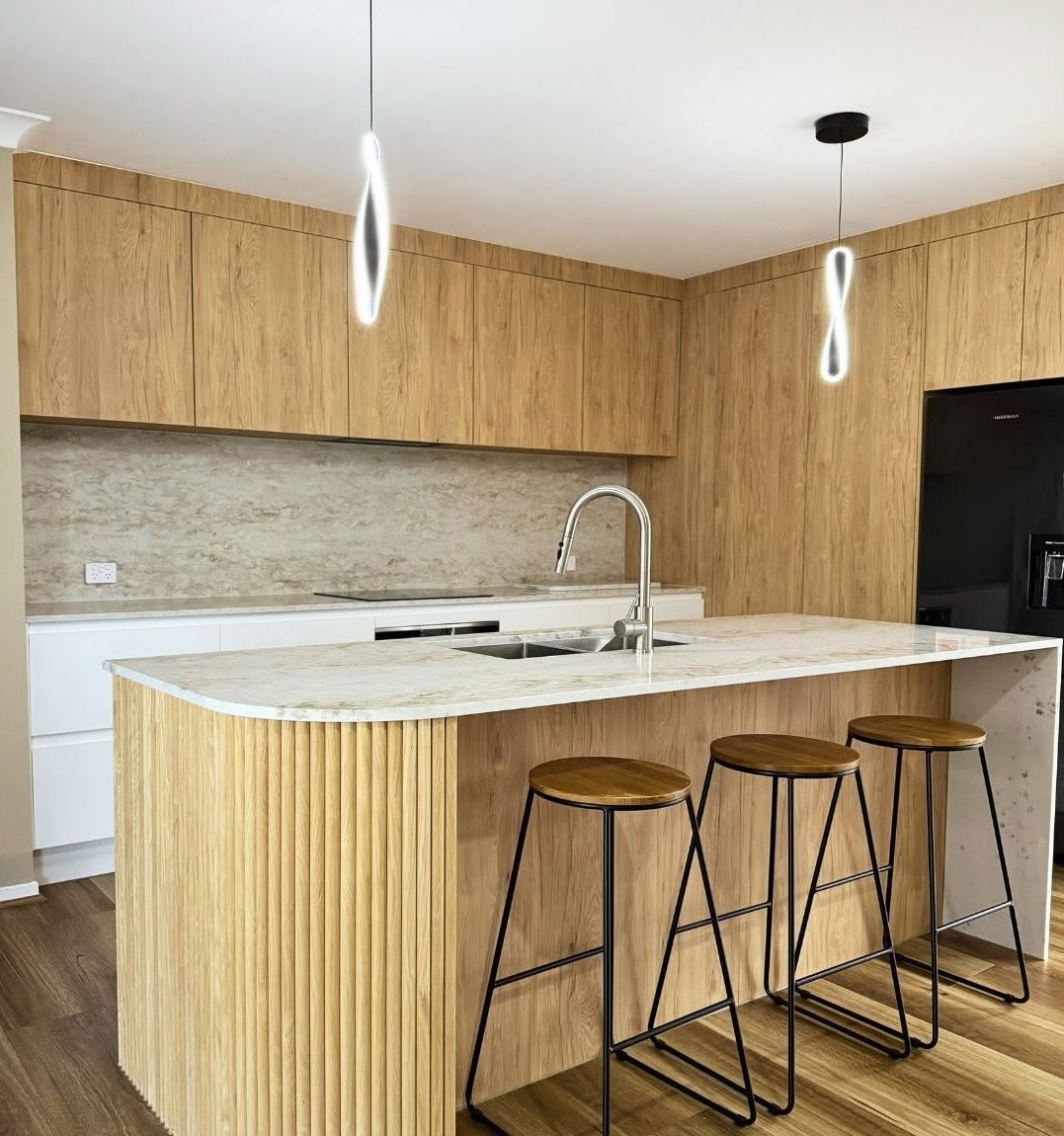 Modern Kitchen With Timber Cabinetry And Stone Island — Zero 21 Fit-Outs & Joinery: Kitchen Renovation Gold Coast in Molendinar, QLD