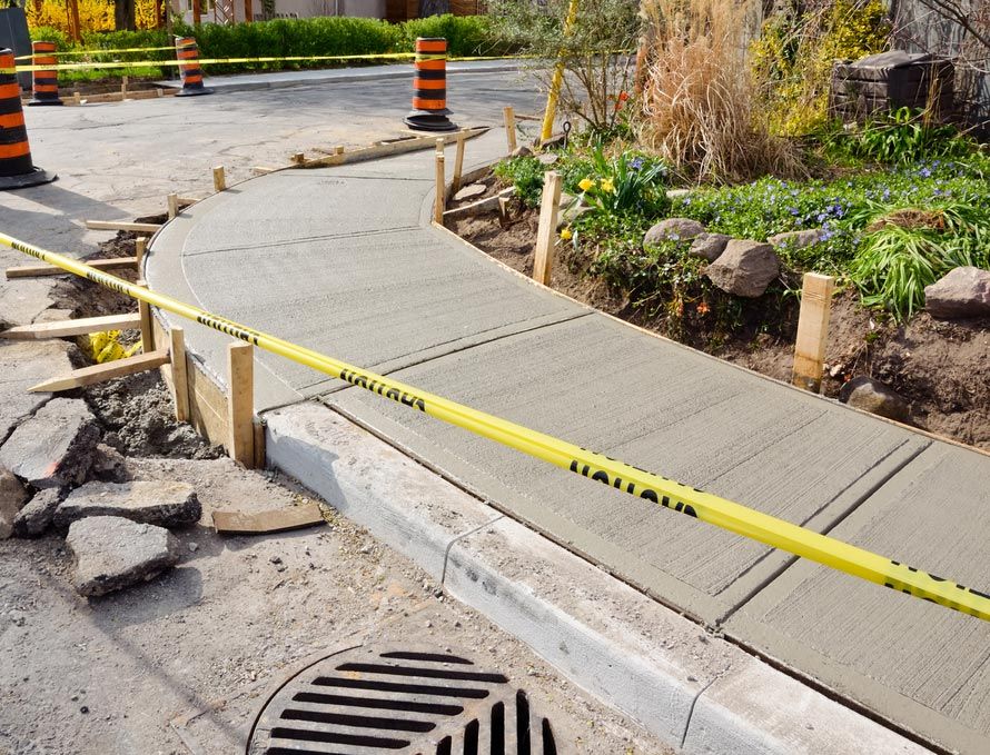 Newly Repaired Concrete Sidewalk In Residential Area — Maitland Concreting Specialists In Port Stephens NSW