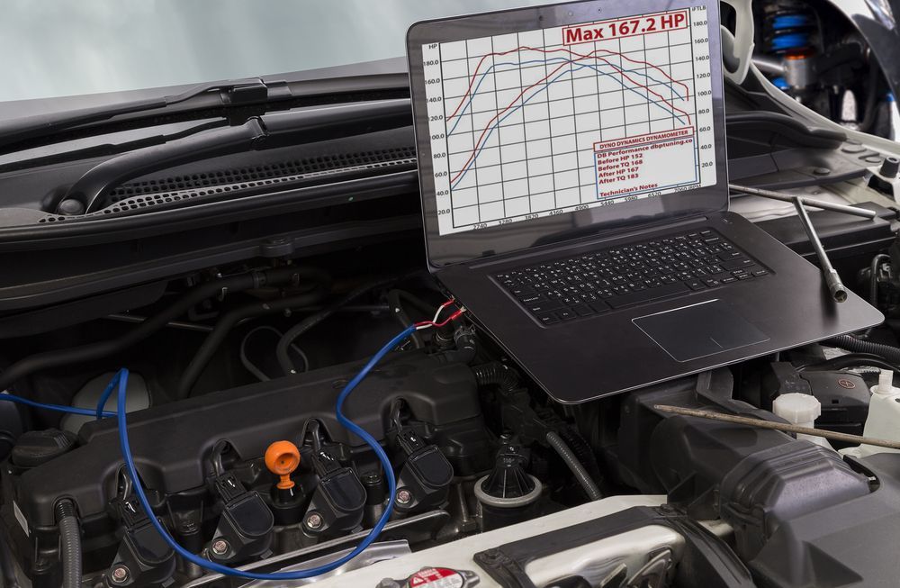 Laptop Displaying Engine Performance Graphs on a Car Engine — Mullumbimby Auto Electrical in Brunswick Heads, NSW