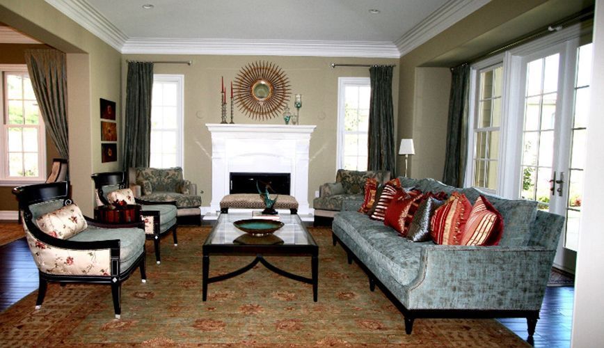 A living room filled with furniture and a fireplace.