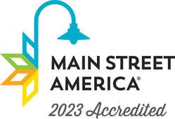 A logo for main street america 2023 accredited with a street light.