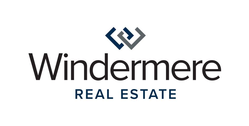 A logo for windermere real estate with a blue and white logo on a white background.