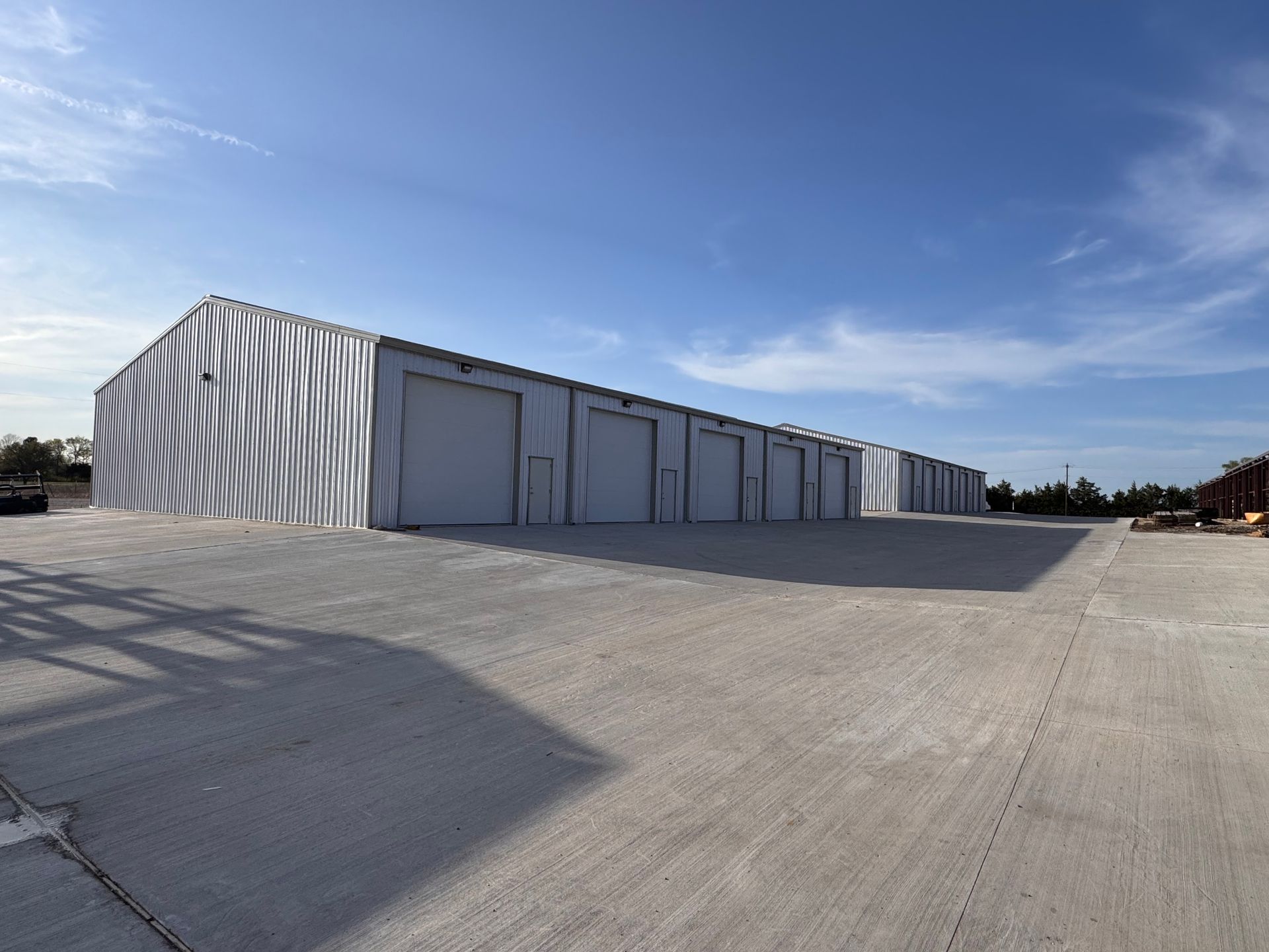 A row of industrial warehouses available for rent on concrete slab 