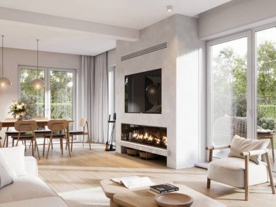 Living room with fireplace, TV, dining area, and large windows overlooking a green yard. Neutral tones and natural light.