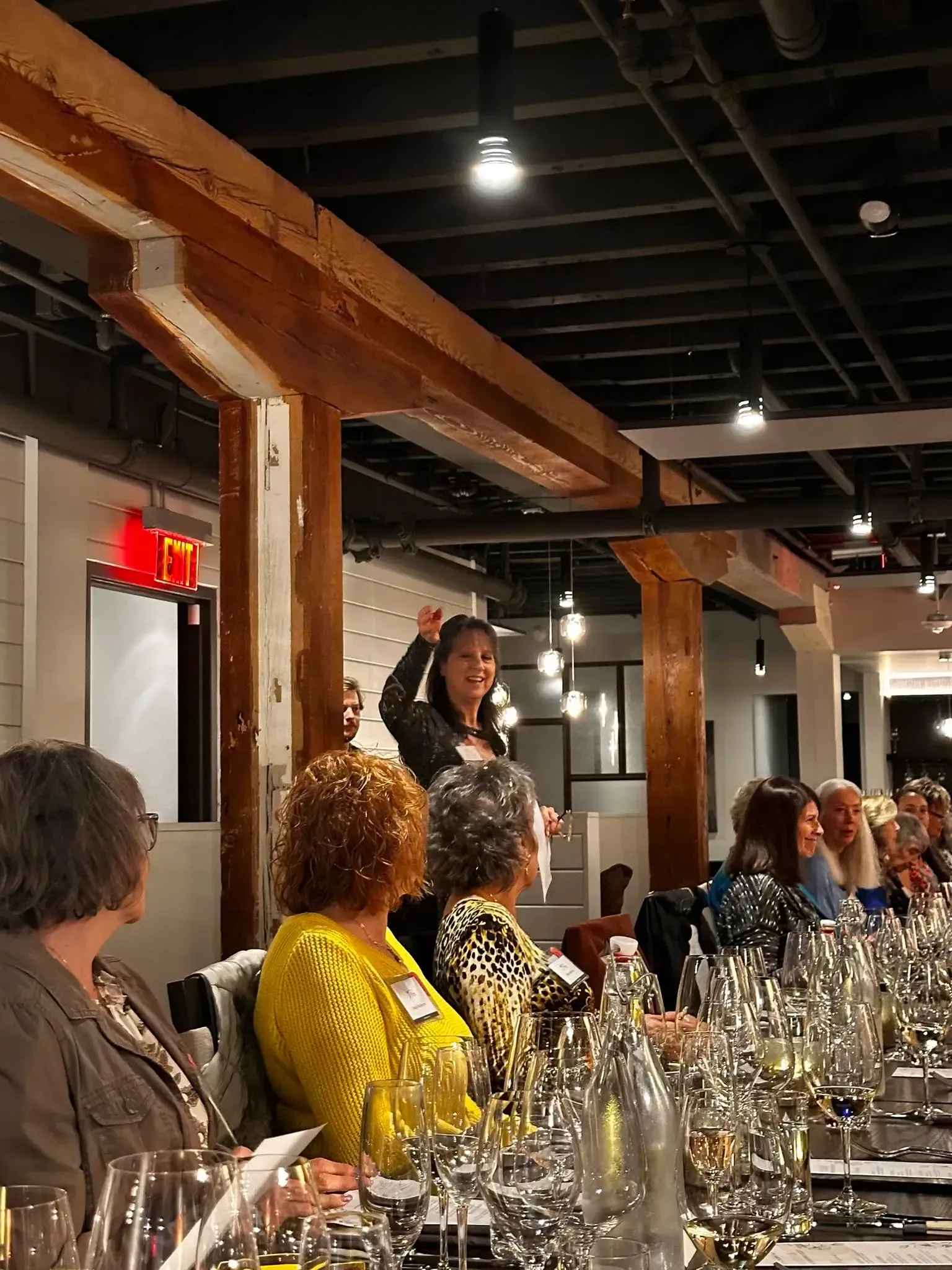 Wine bottle with red label reading