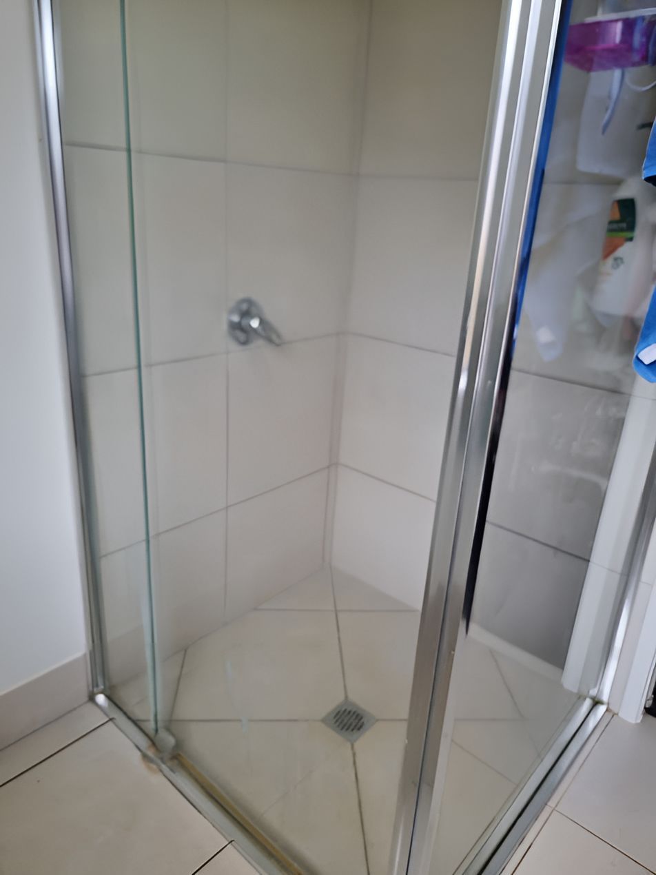 A Bathroom With A Walk In Shower With A Glass Door — A1 Cleaner Carpets N Homecare In Atherton, QLD