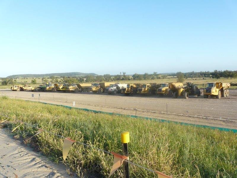 Line of Bulldozers — Earthmoving & Excavation Services in Rockhampton, QLD
