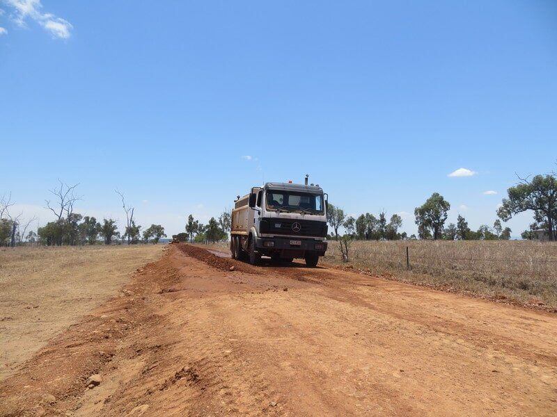 Truck on a Rough Road — Earthmoving & Excavation Services in Rockhampton, QLD