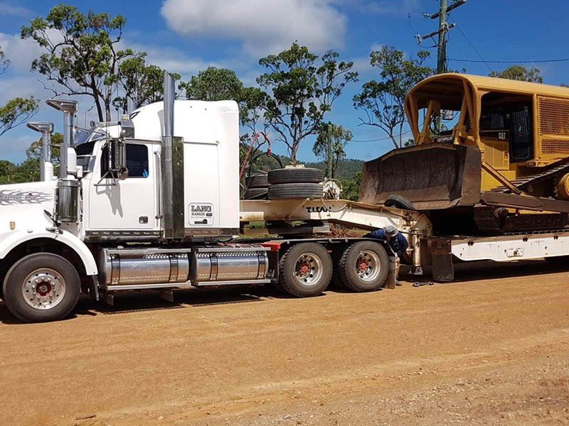 Big Truck and Excavator Machine — Earthmoving & Excavation Services in Rockhampton, QLD