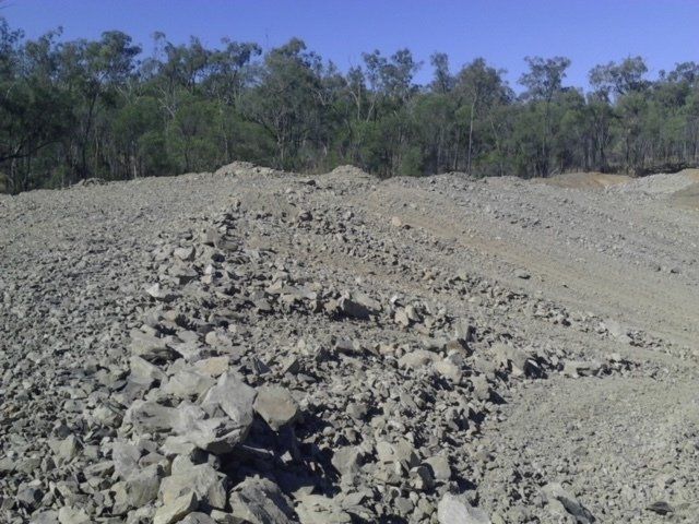 Empty Land With Gravel And Sand — Earthmoving & Excavation Services in Rockhampton, QLD