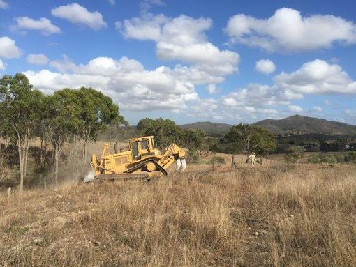 A bulldozer on a land rehabilitation project in Rockhampton