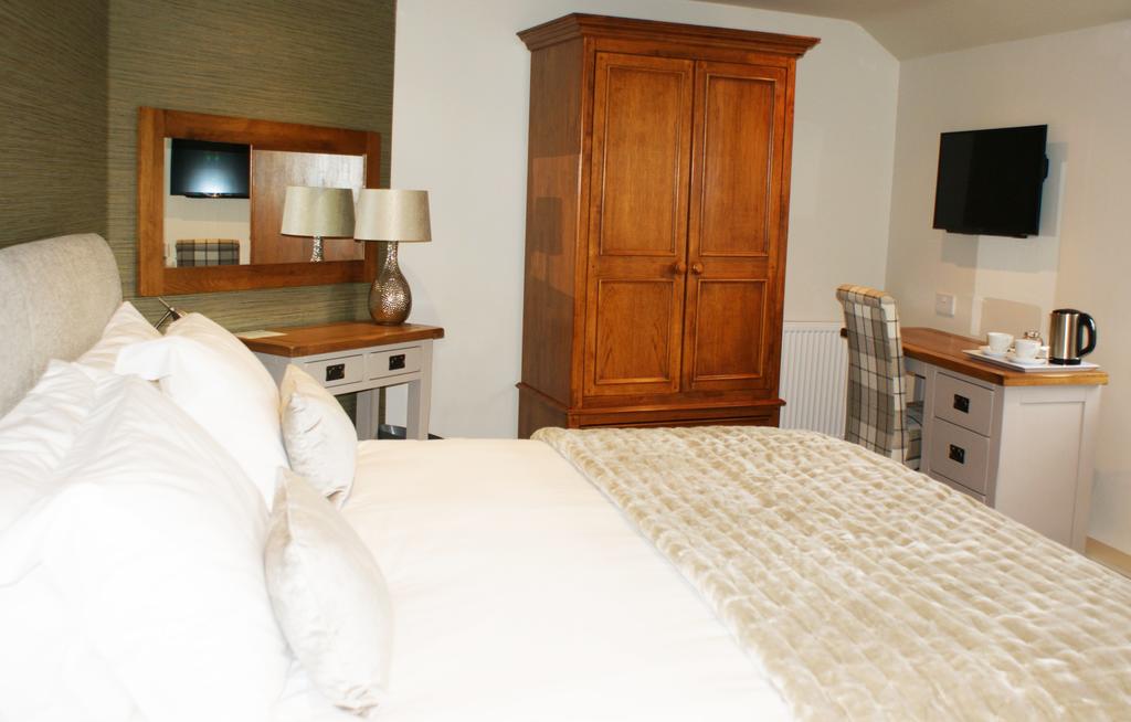 hotel room with bed and cupboard