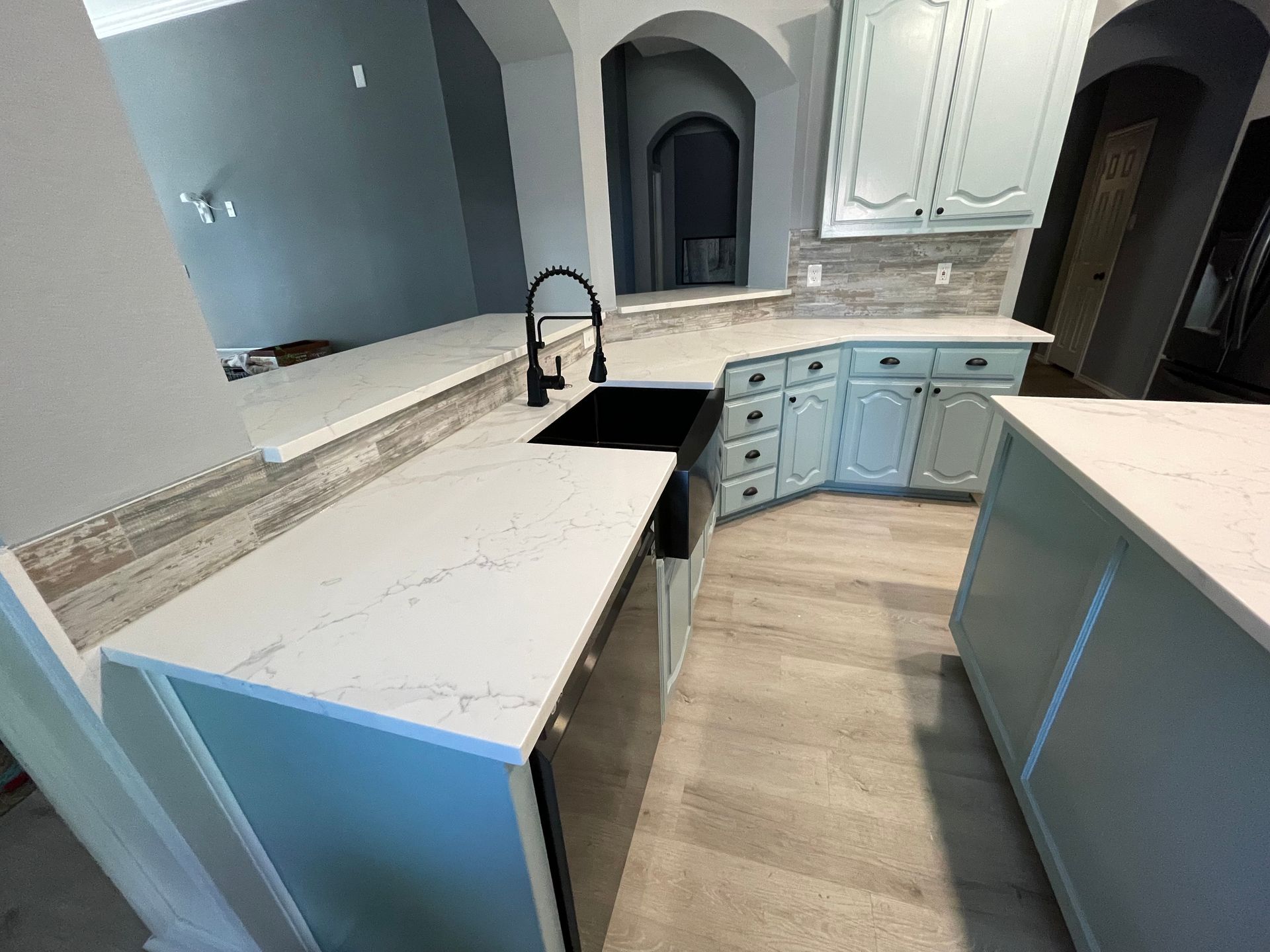 Quartz kitchen countertops and farm sink install 