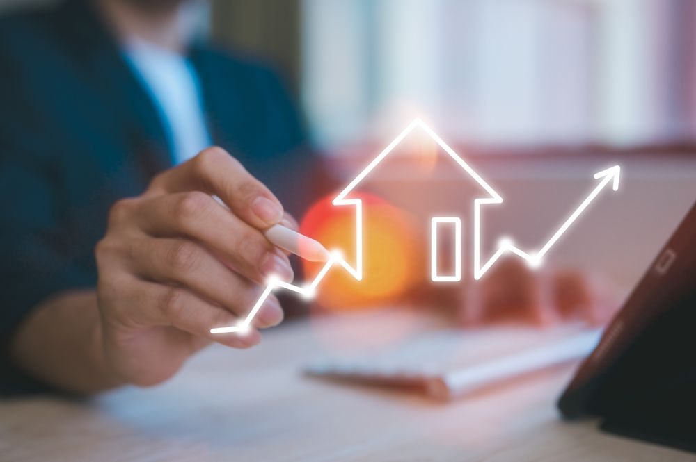 A person is drawing a graph on a tablet.